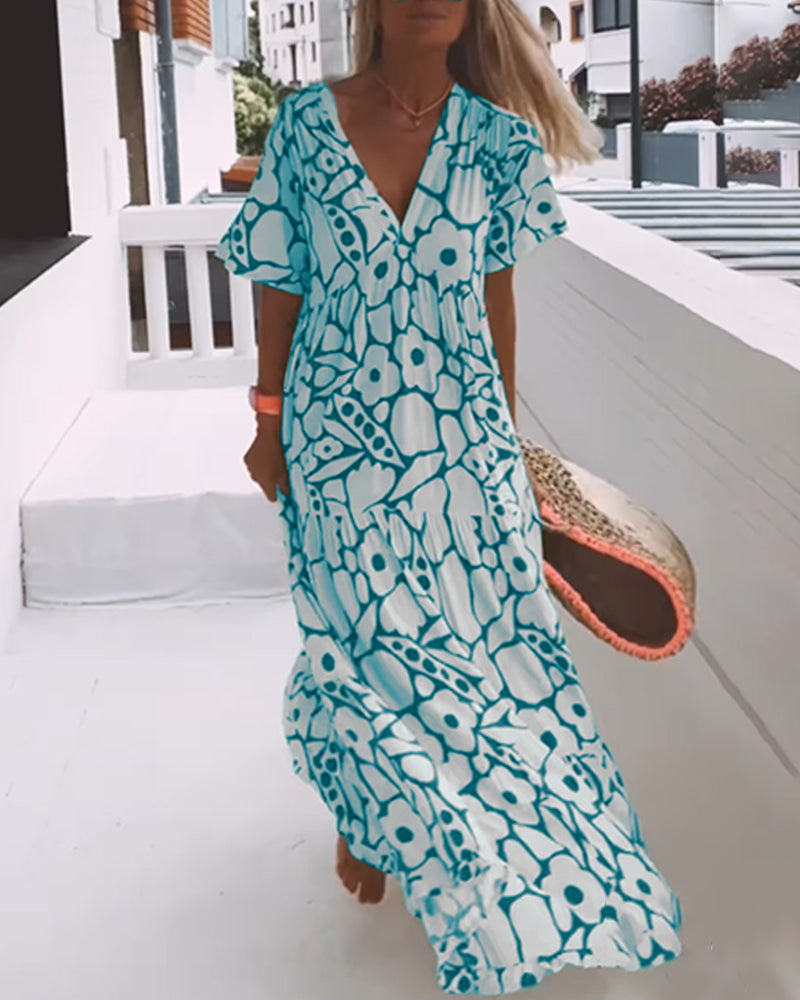 Agnes | Losse Jurk met V-hals en Print