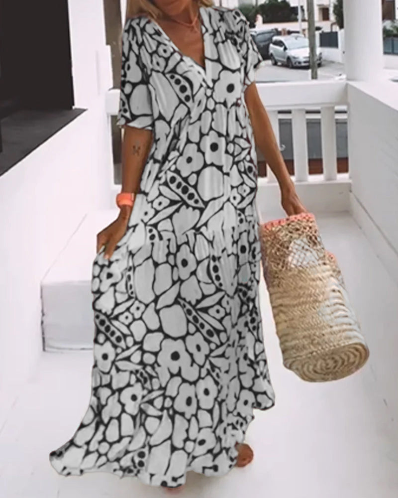 Agnes | Losse Jurk met V-hals en Print