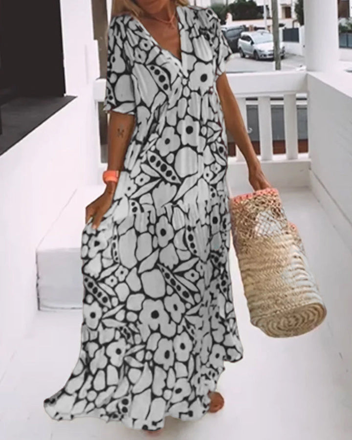 Agnes | Losse Jurk met V-hals en Print